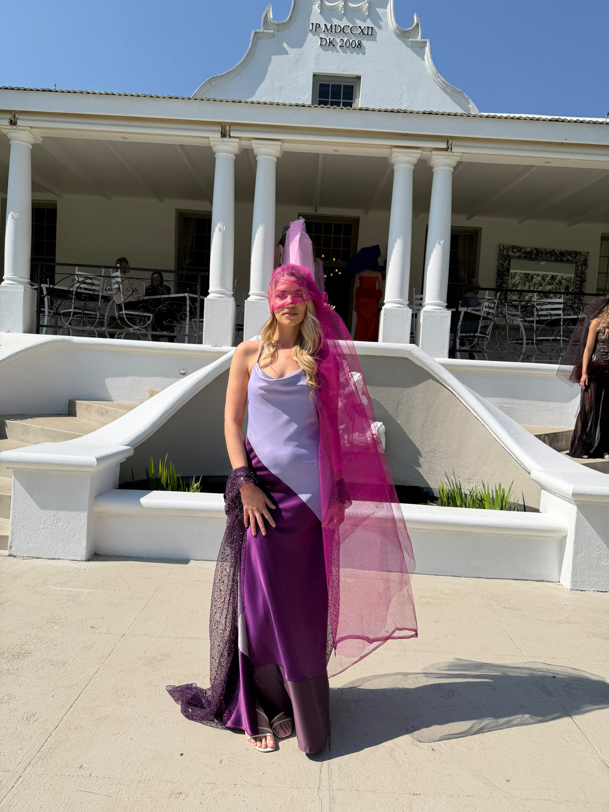 The Wisteria Dress in Lilac & Plum - front view by the steps